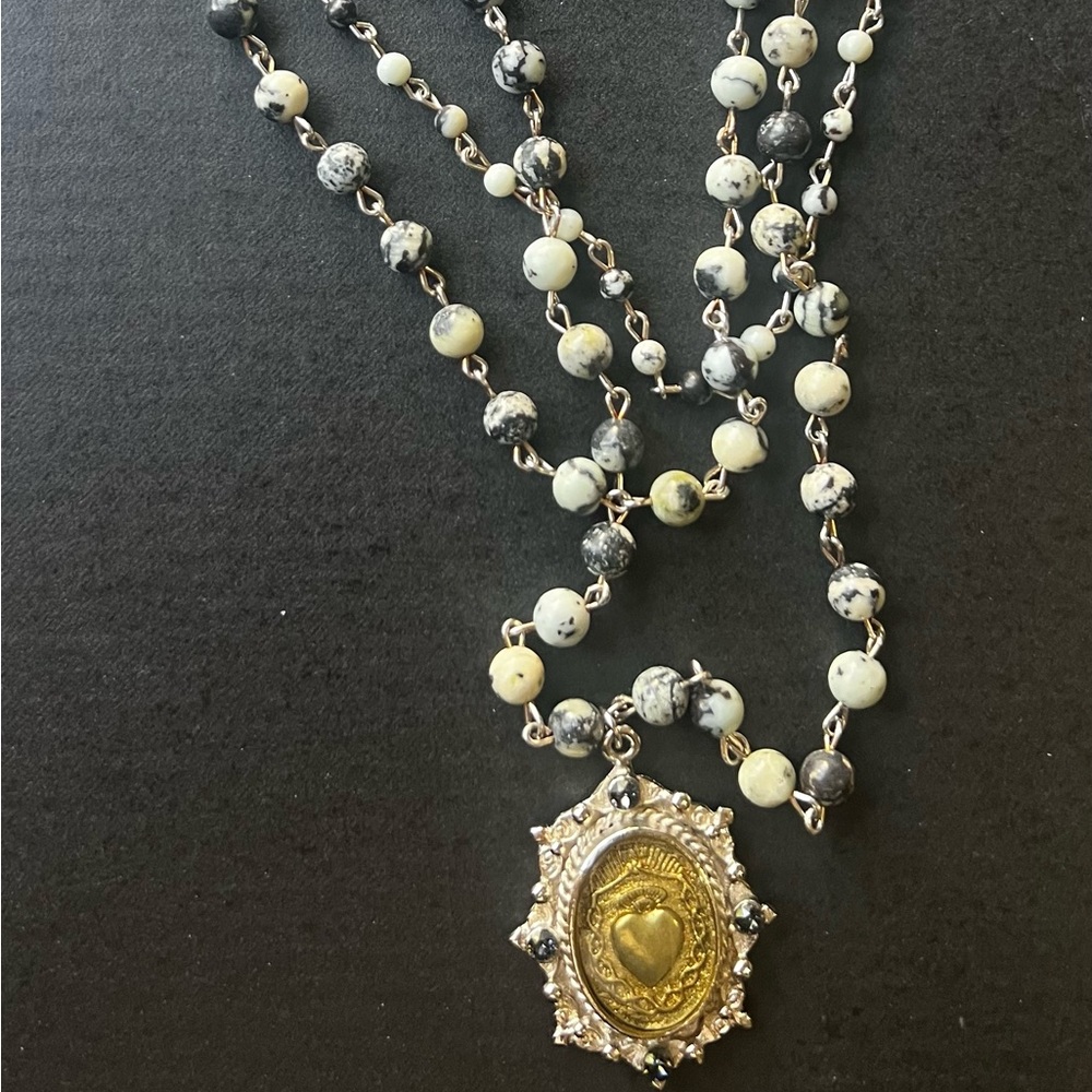 Virgins Saints & Angels Gold and Black Necklace with Intricate Design
✨REDUCED✨